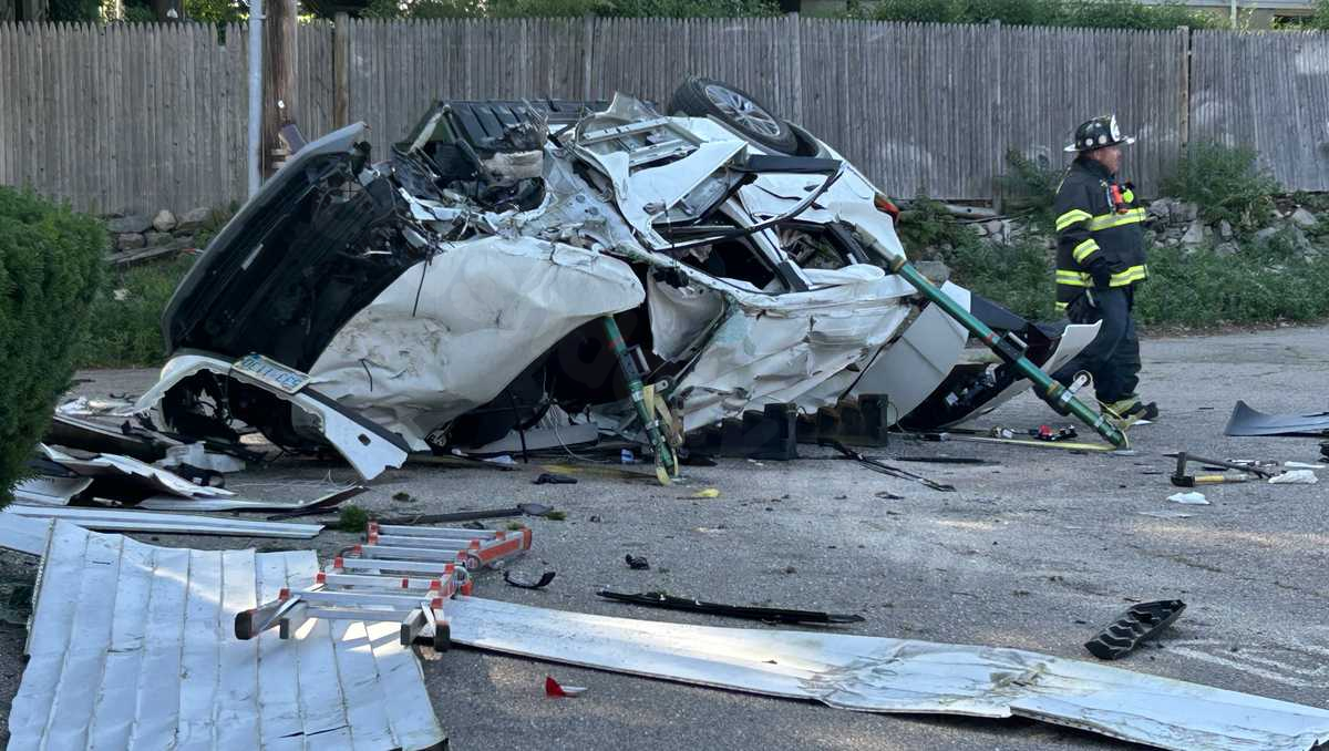 Car flips over in Route 1 crash, bouncing off nearby motel; Injuries unknown