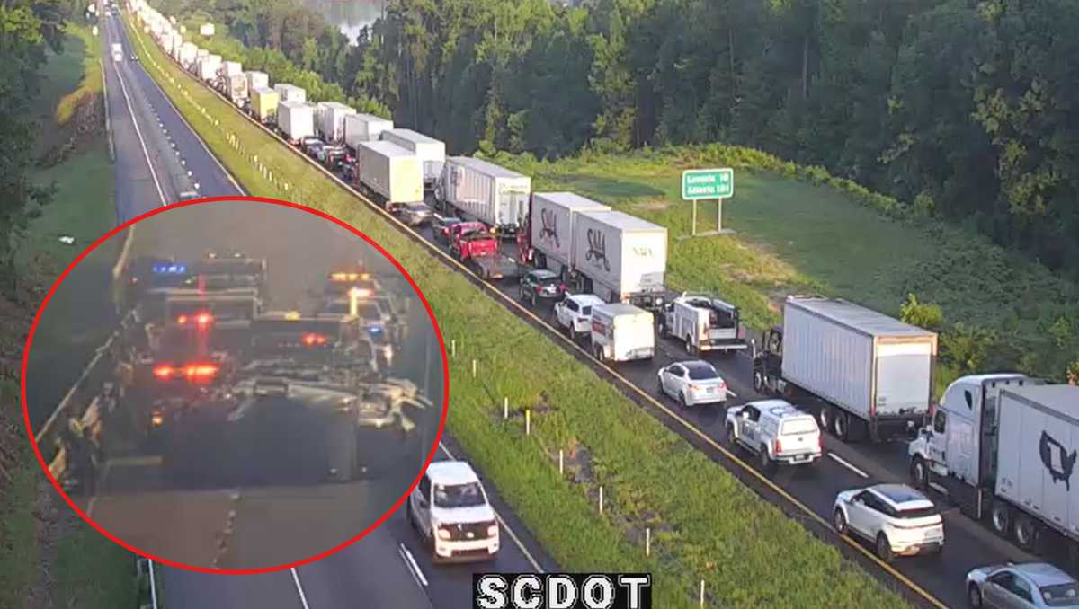 Car hauler overturns on I-85 spilling oil into Lake Hartwell; lanes still blocked