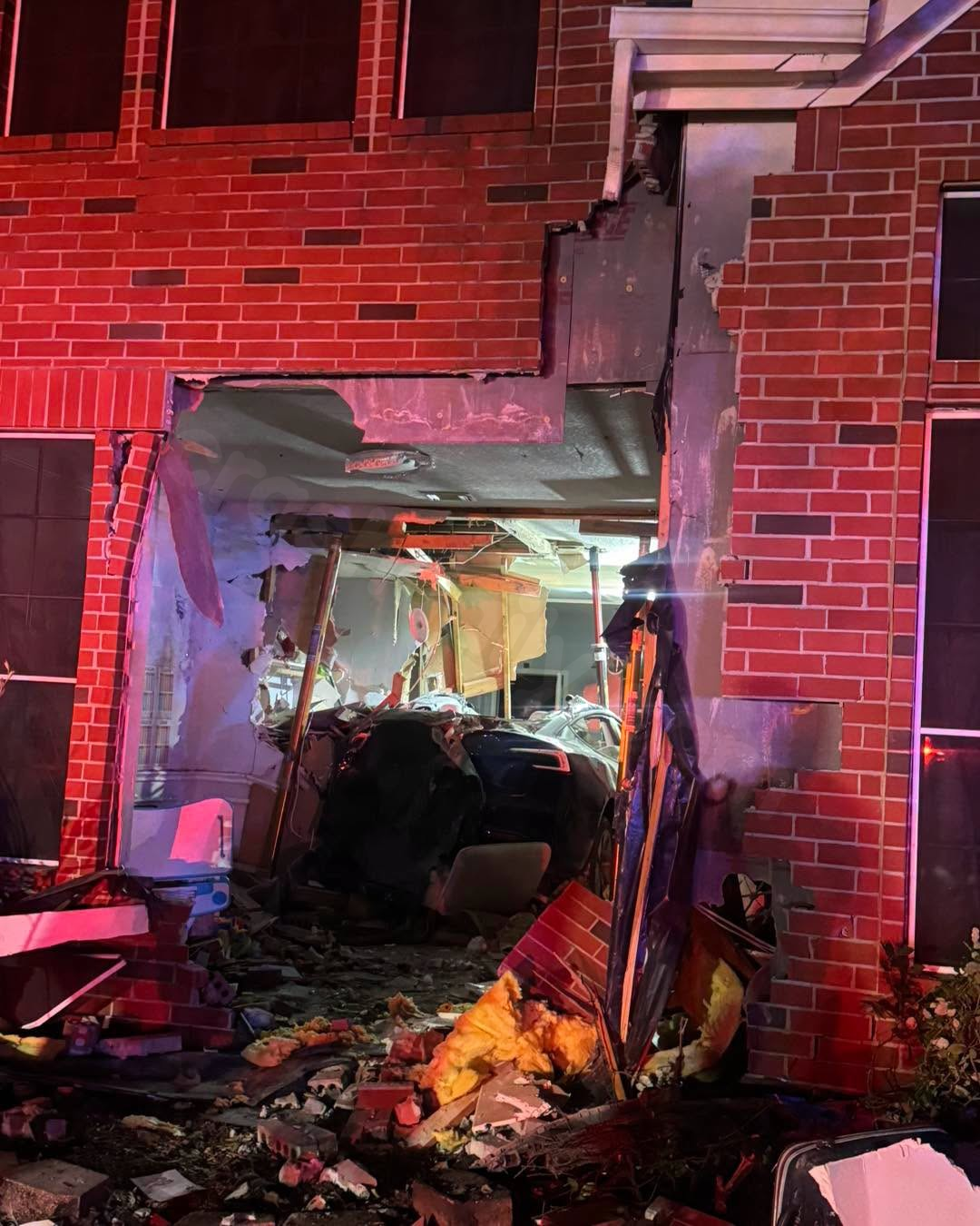 Man who was driving Tesla when it crashed into Katy home charged with manslaughter, sheriff says