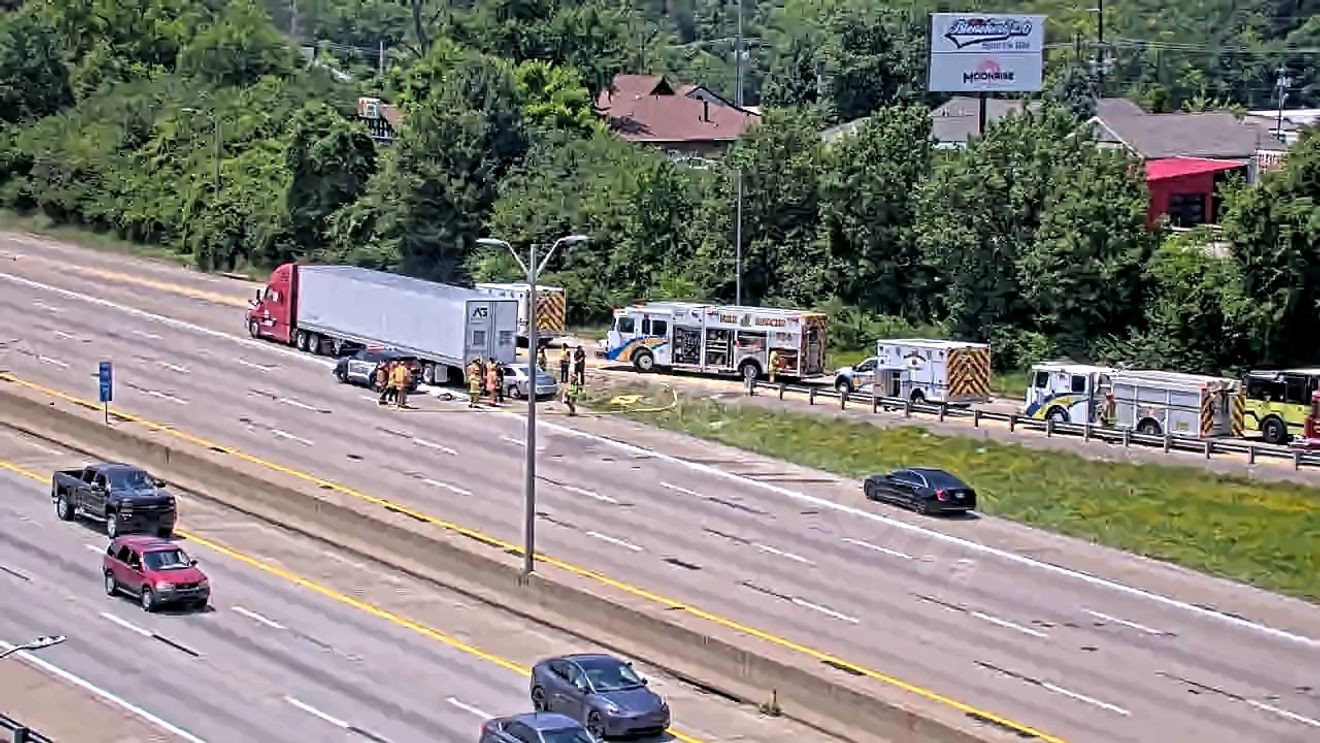 Woman killed after car hits parked tractor-trailer on I-75 in NKY