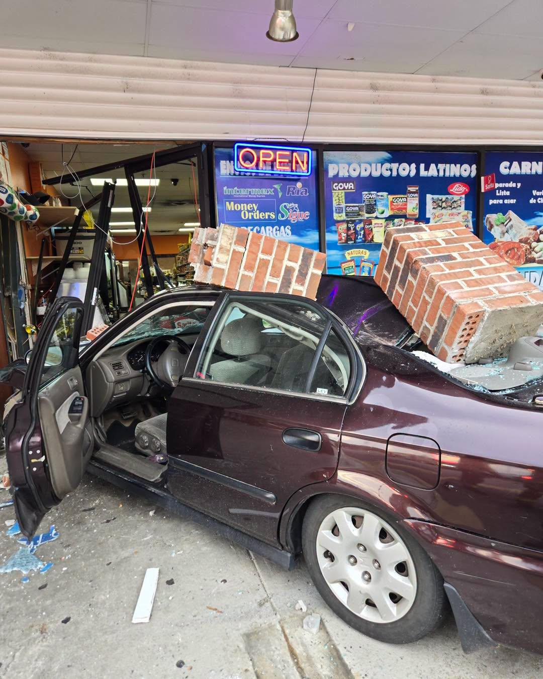 Teenager in hospital after car crashes into Chesterfield business