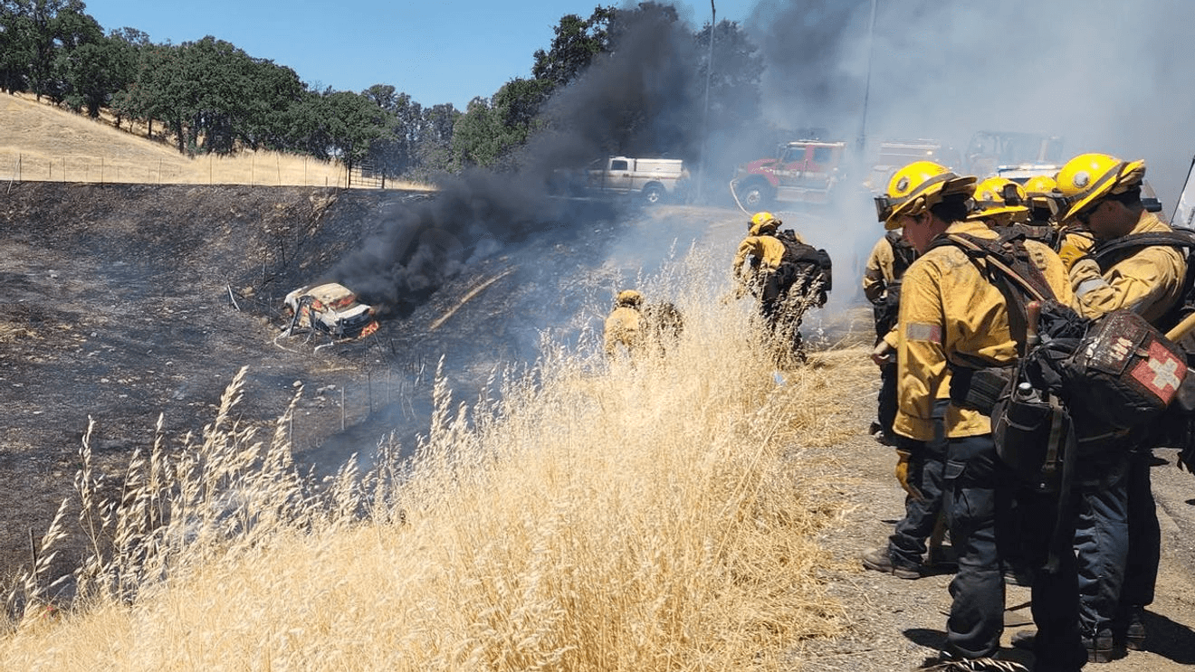 Vehicle fire spreads to vegetation near Cottonwood