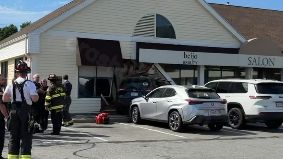 3 injured after car crashes into Mass. salon
