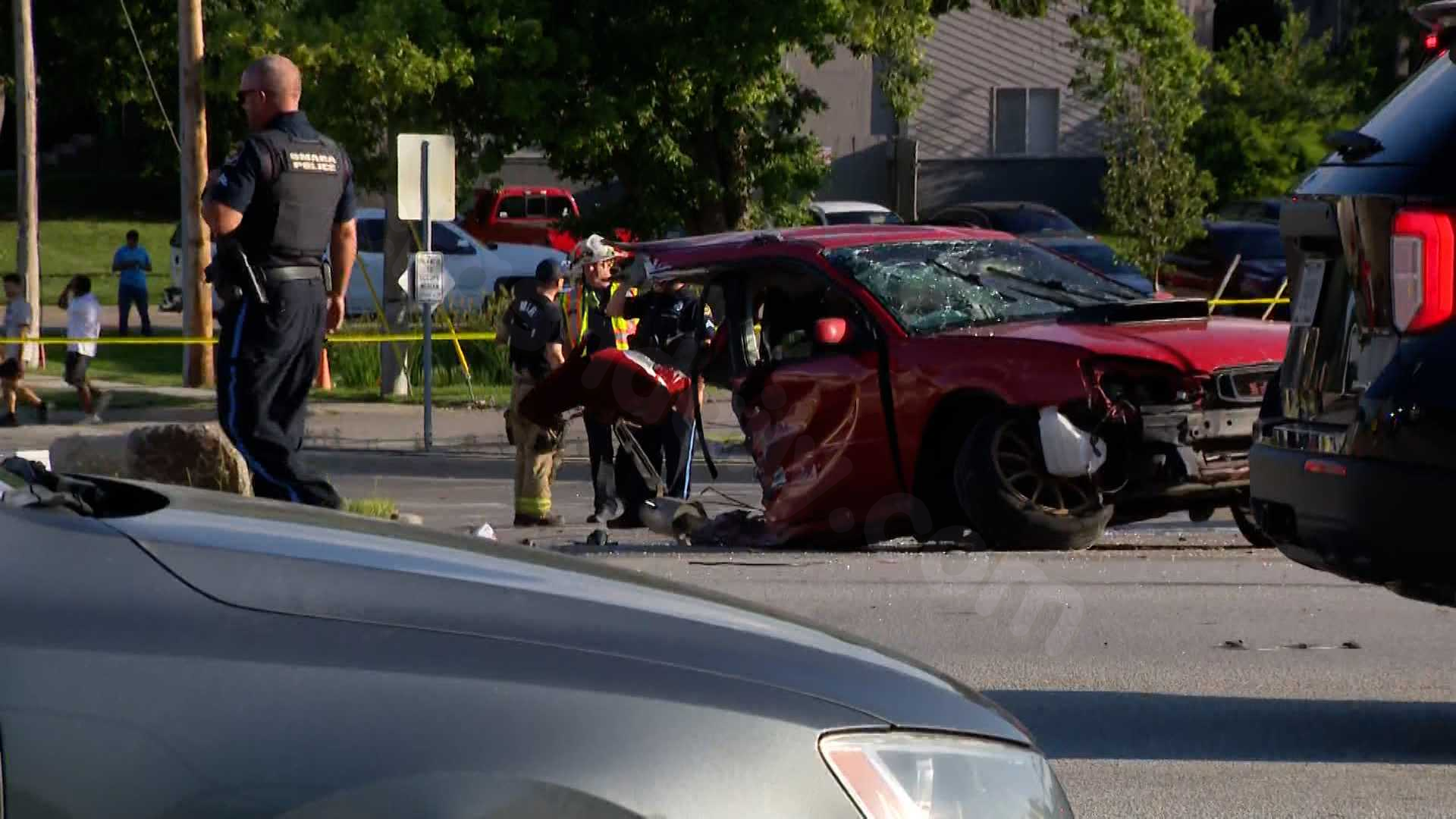 Omaha police investigate crash that sent two people to the hospital with CPR in progress