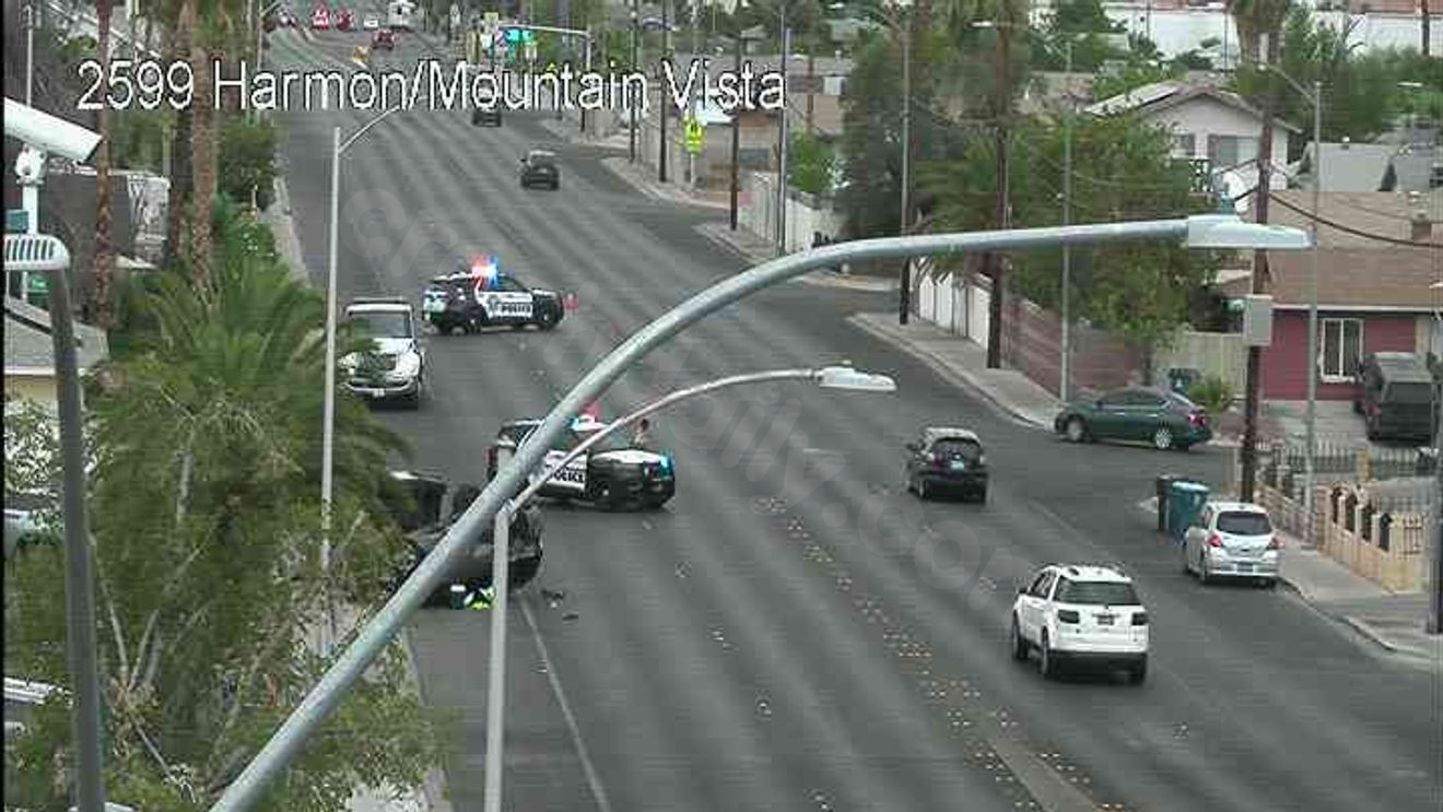 Driver briefly trapped after rollover crash in southeast Las Vegas