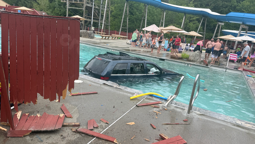 Photos: SUV drives into swimming pool at Smugglers' Notch Resort; Person in police custody