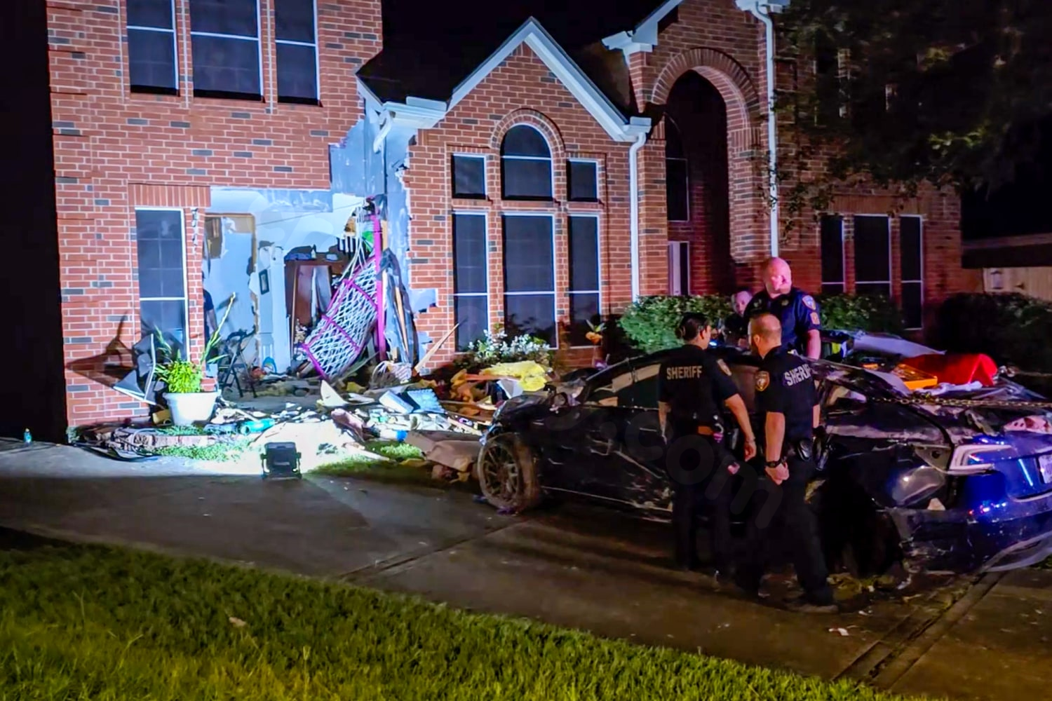 Tesla driver whose car slammed into Texas home overrode driver assistance mode, NTSB says