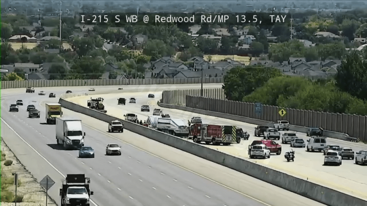 TRAFFIC ALERT: One dead after semi‑truck, car collide on I‑215 in Taylorsville, road closed
