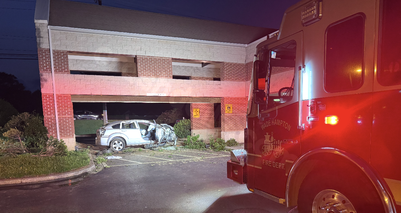 Crews responding after a car crashed into a library in Greenville County